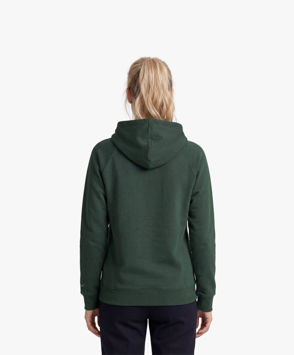 Vue de dos d’une femme portant le hoodie vert profond Salut Fred