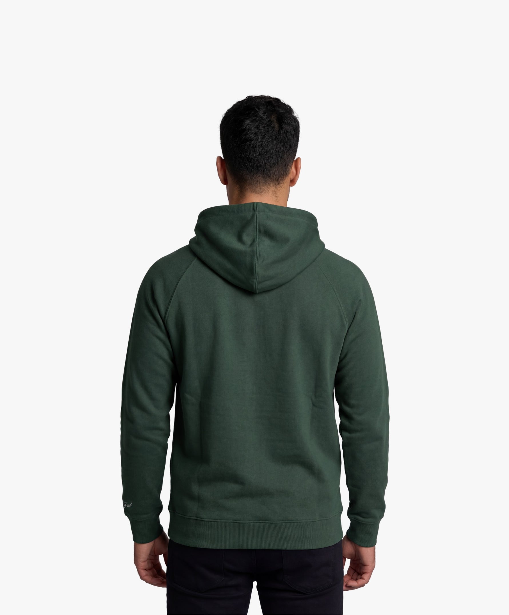 Vue de dos d’un homme portant le hoodie vert profond Salut Fred