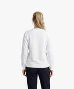 Vue de dos d’une femme portant un sweatshirt blanc Salut Fred de la collection Rues de France