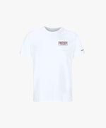 Vue de face du t-shirt classique blanc Salut Fred avec broderie « Thérap(e)ute À votre service » sur la poitrine gauche et broderie Salut Fred sur la manche gauche