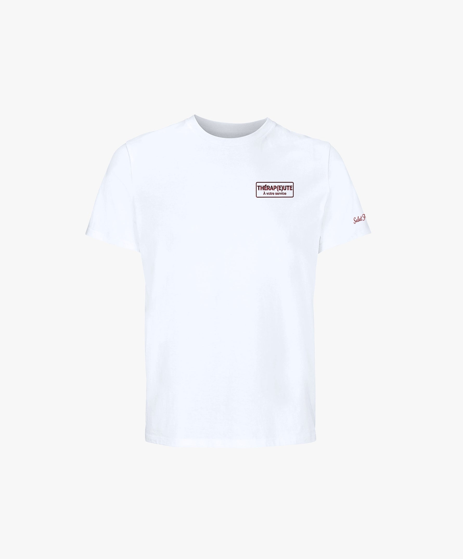 Vue de face du t-shirt classique blanc Salut Fred avec broderie « Thérap(e)ute À votre service » sur la poitrine gauche et broderie Salut Fred sur la manche gauche