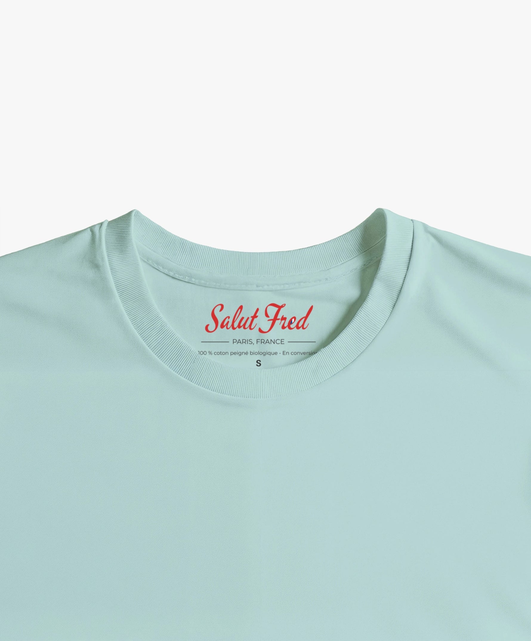 Vue intérieure du col du t-shirt classique bleu opalin Salut Fred de la collection Pride « This is not woke. You are just a dick. »