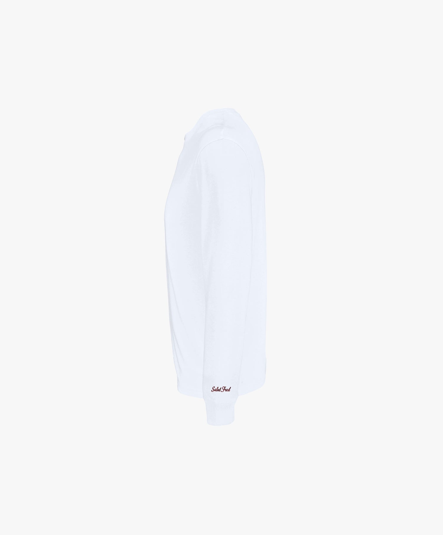Vue côté gauche du t-shirt manches longues blanc Salut Fred avec motif brodé « Thérap(e)ute. À votre service » sur la poitrine gauche et logo Salut Fred brodé sur le poignet gauche