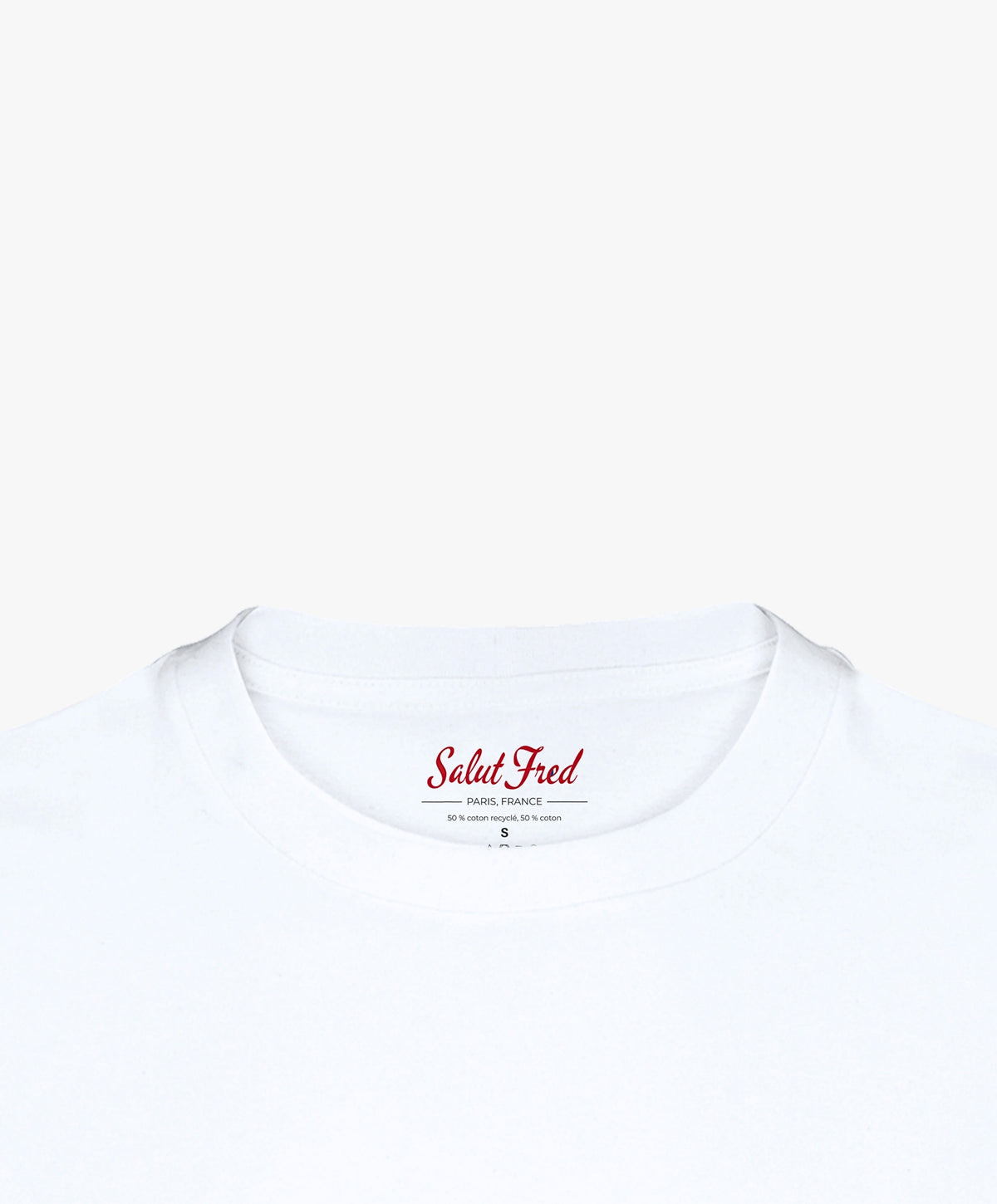 Vue col intérieur du t-shirt oversize blanc « Melon Melèche » avec étiquette intérieure Salut Fred.